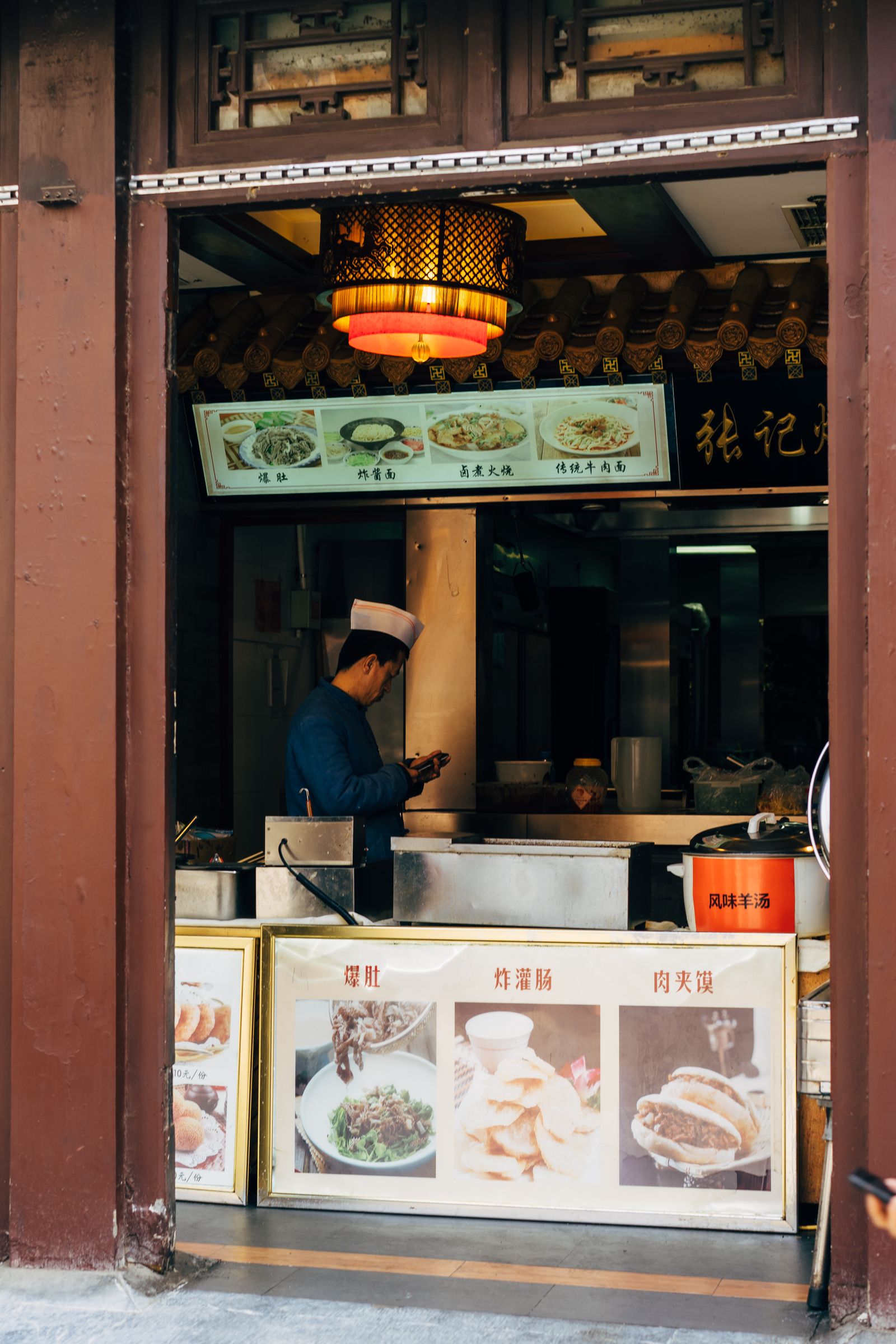 Chef working inside an Asian restaurant