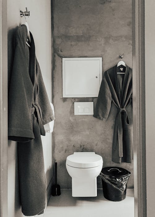Free Gray Bathrobes Hanging in the Bathroom Stock Photo