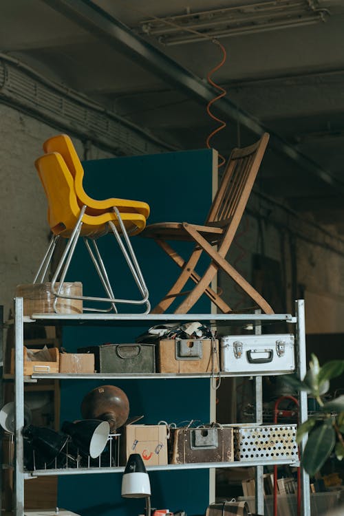 Brown Wooden Chair Beside Blue and White Wooden Table