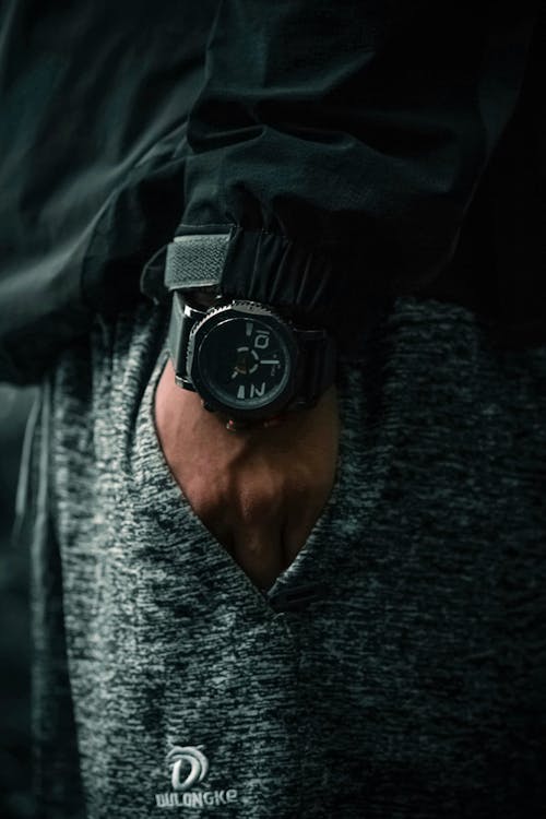 A Man Wearing a Sporty Wristwatch