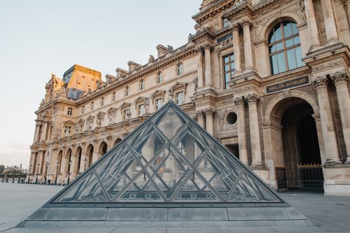 Free Iconic Louvre Museum with glass pyramid, a must-see in Paris. Stock Photo