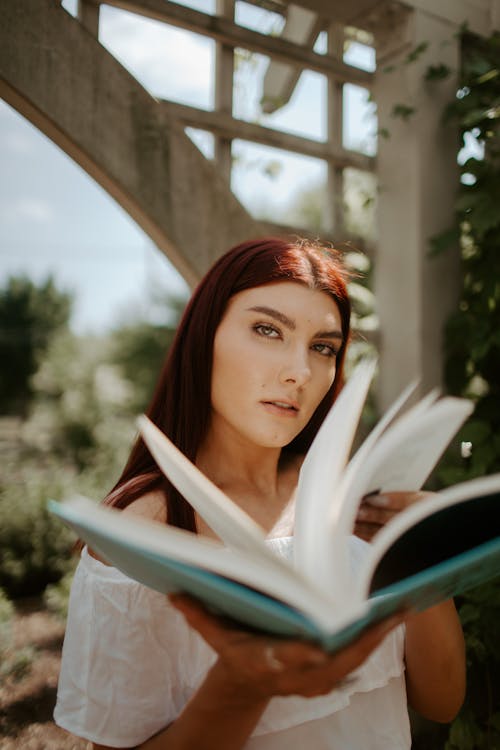 Woman Holding a Book