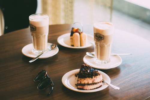 Free Cakes and Drinks on a Table Stock Photo