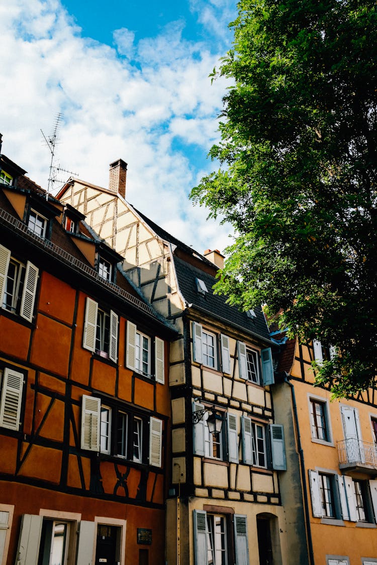 Facade Of Colorful Half Timbered Buildings On Street