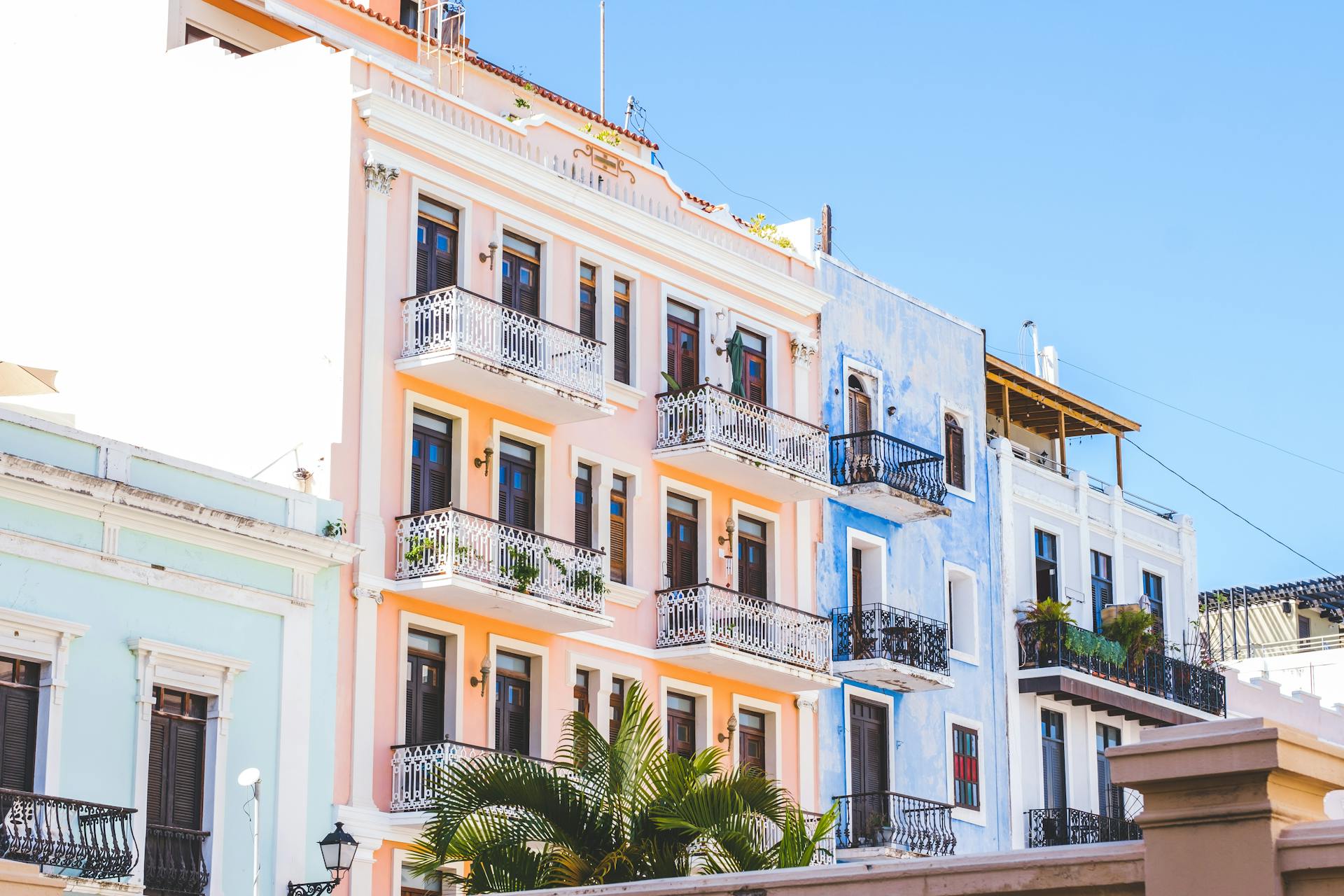 Vibrant colonial buildings with balconies in Old San Juan, Puerto Rico.