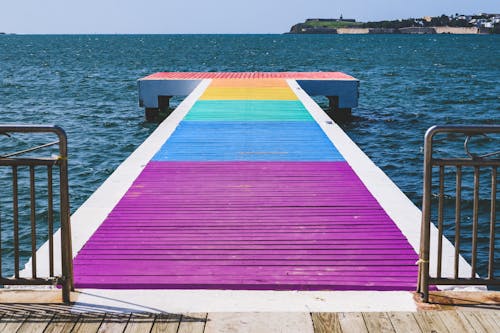 Colorful Wooden Dock Over the Sea