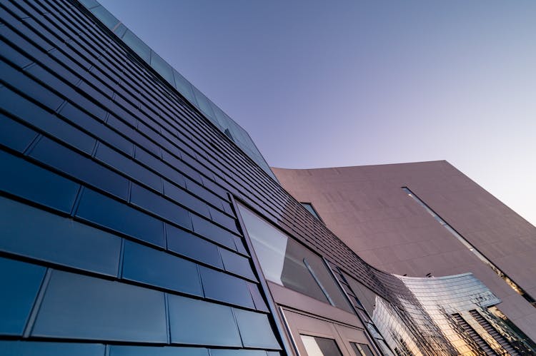 Facade Of Modern Building With Curvy Wall In Daylight