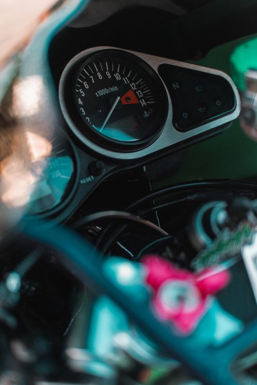Free Detailed shot of a motorcycle's tachometer and dashboard in focus. Stock Photo