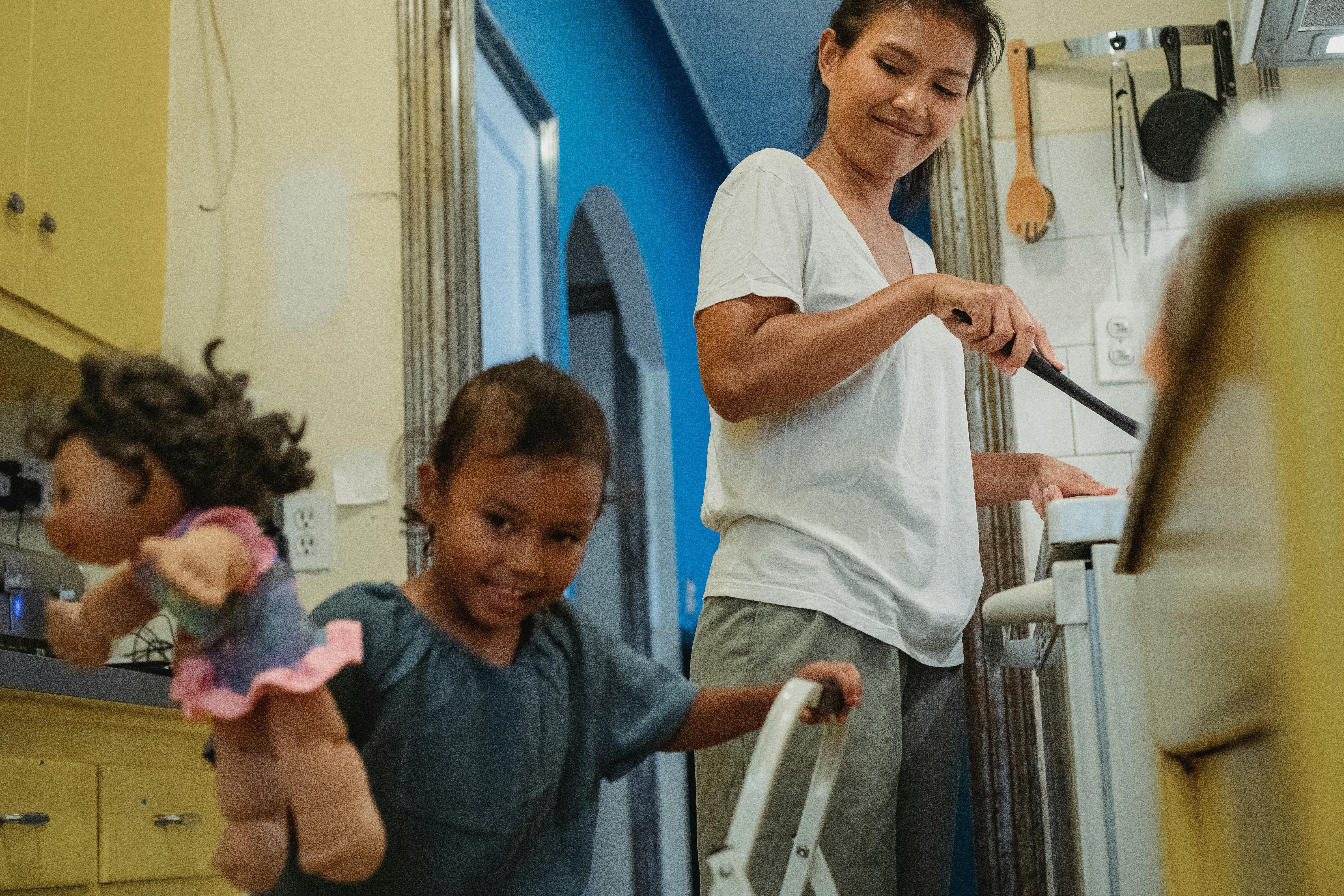 woman and girl in kitchen