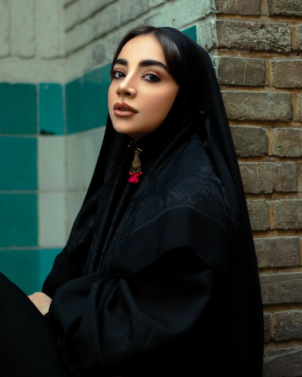 Portrait in traditional black hijab