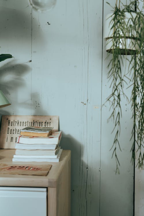 Brown Cardboard Boxes on Brown Wooden Table