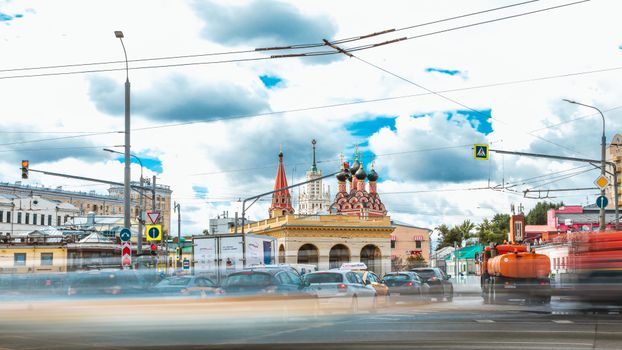 Timelapse view of traffic and St Nicolas Church in bustling Moscow, Russia.