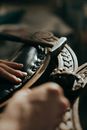 Person Holding Black Leather Shoe