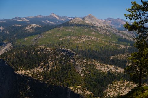 Free Breathtaking aerial view of the majestic Yosemite Valley with lush forests and mountains. Stock Photo