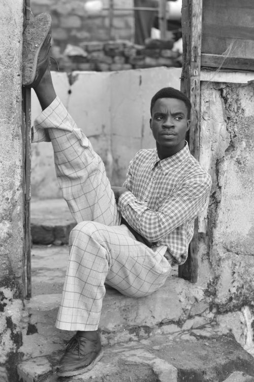 Free Monochrome portrait of a fashionable man posing in vintage style. Stock Photo