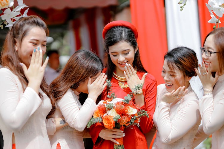 Happy Asian Bride And Guests On Party