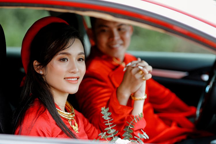 Happy Asian Women Smiling In Car