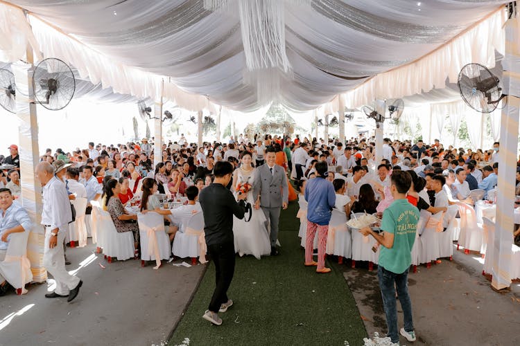 Group Of People On Wedding Banquet