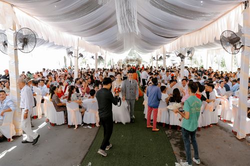 Free Group of people gathering together for wedding ceremony and party in decorated area Stock Photo