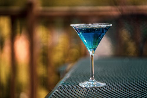 Close-Up Shot of a Glass of Blue Martini