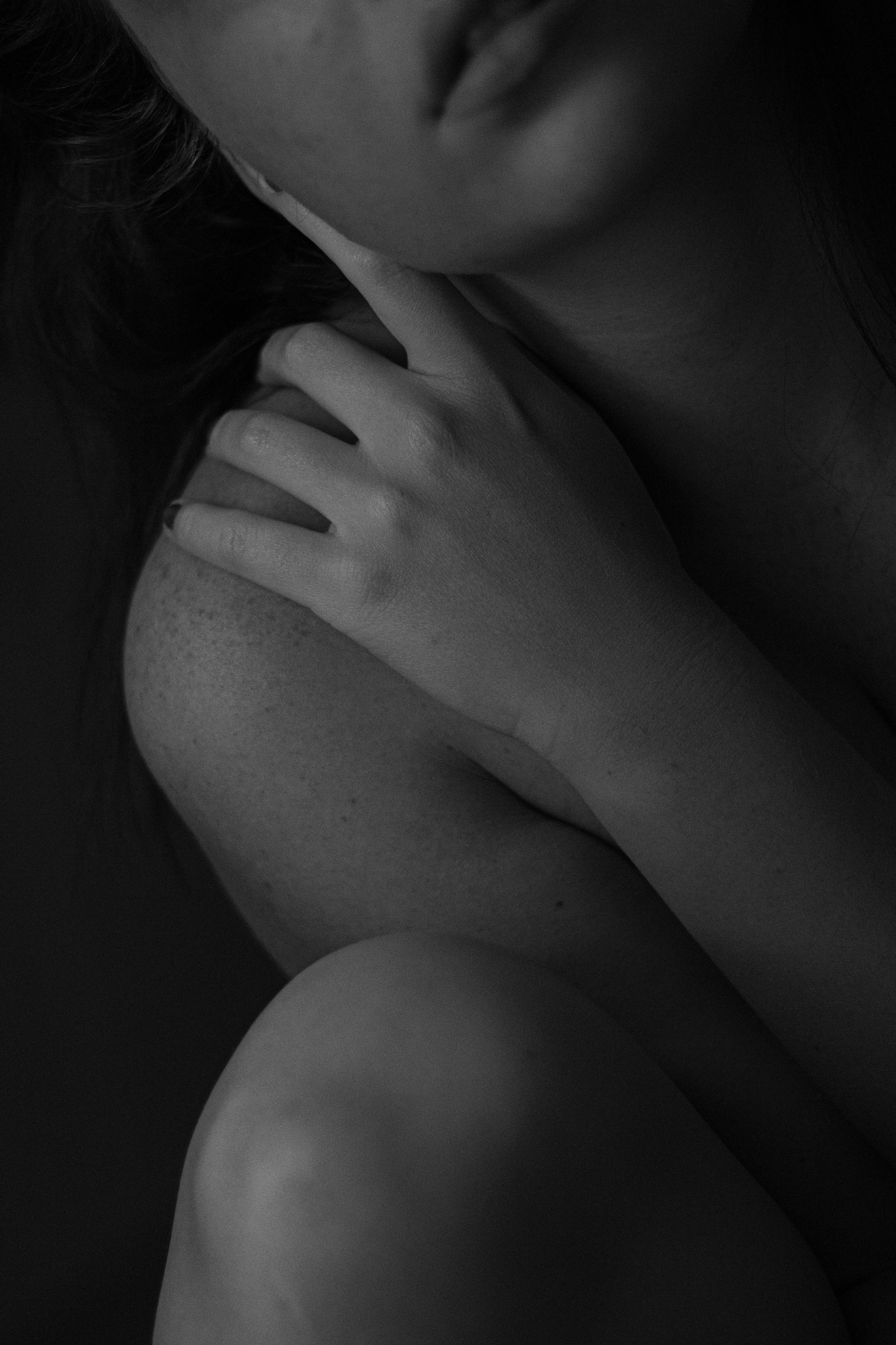 3456px x 5184px - Nude young woman against black background Â· Free Stock Photo