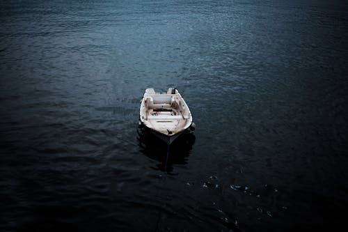 Lifeboat on calm water in dusk