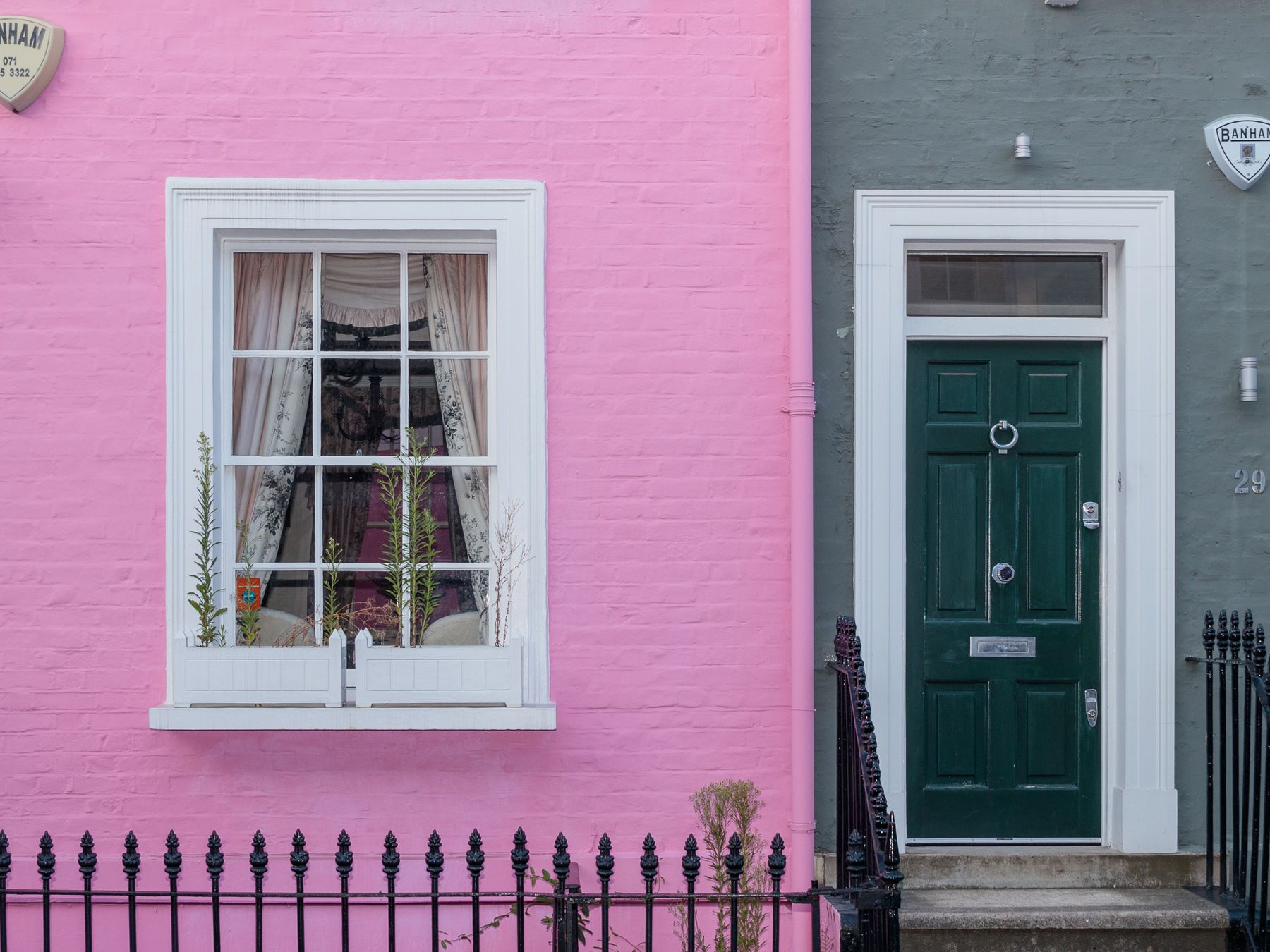 Exterior Painting in West Hendon — clean edges cut in around trim and sockets