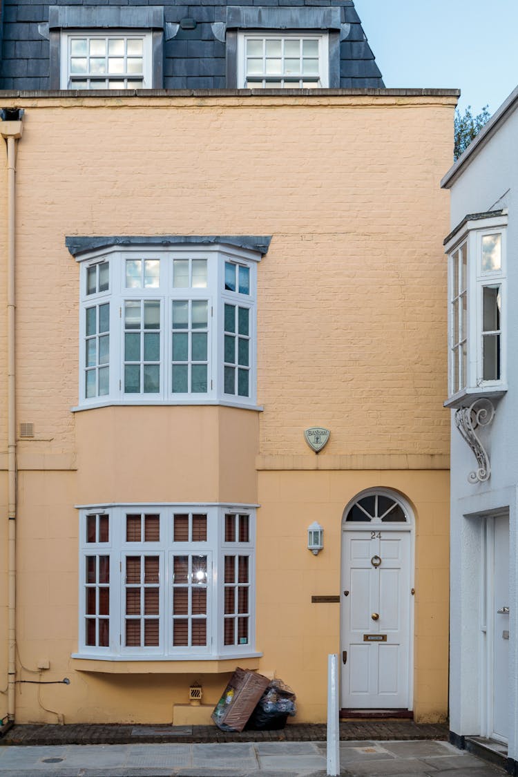 Exterior Of Residential House With Big Windows And Door