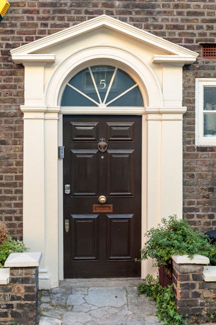 Elegant restored front door with brick facade