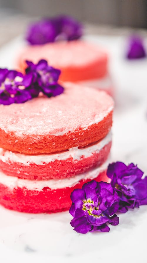 A Cake with Flowers as Garnish