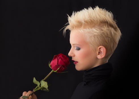 Woman Holding Red Rose