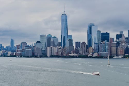 Free City of New York and the Hudson River Under a Cloudy Sky Stock Photo