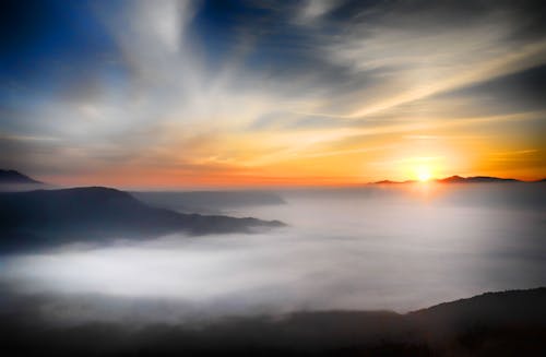 Free Sunrise over Mountain Stock Photo