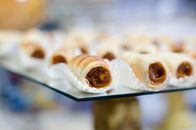 Baked Goods with Chocolate Filling on a Glass Surface