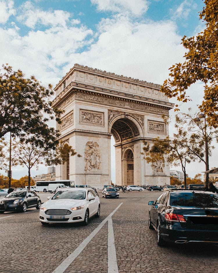 Cars Near The Arc De Triomphe In Paris