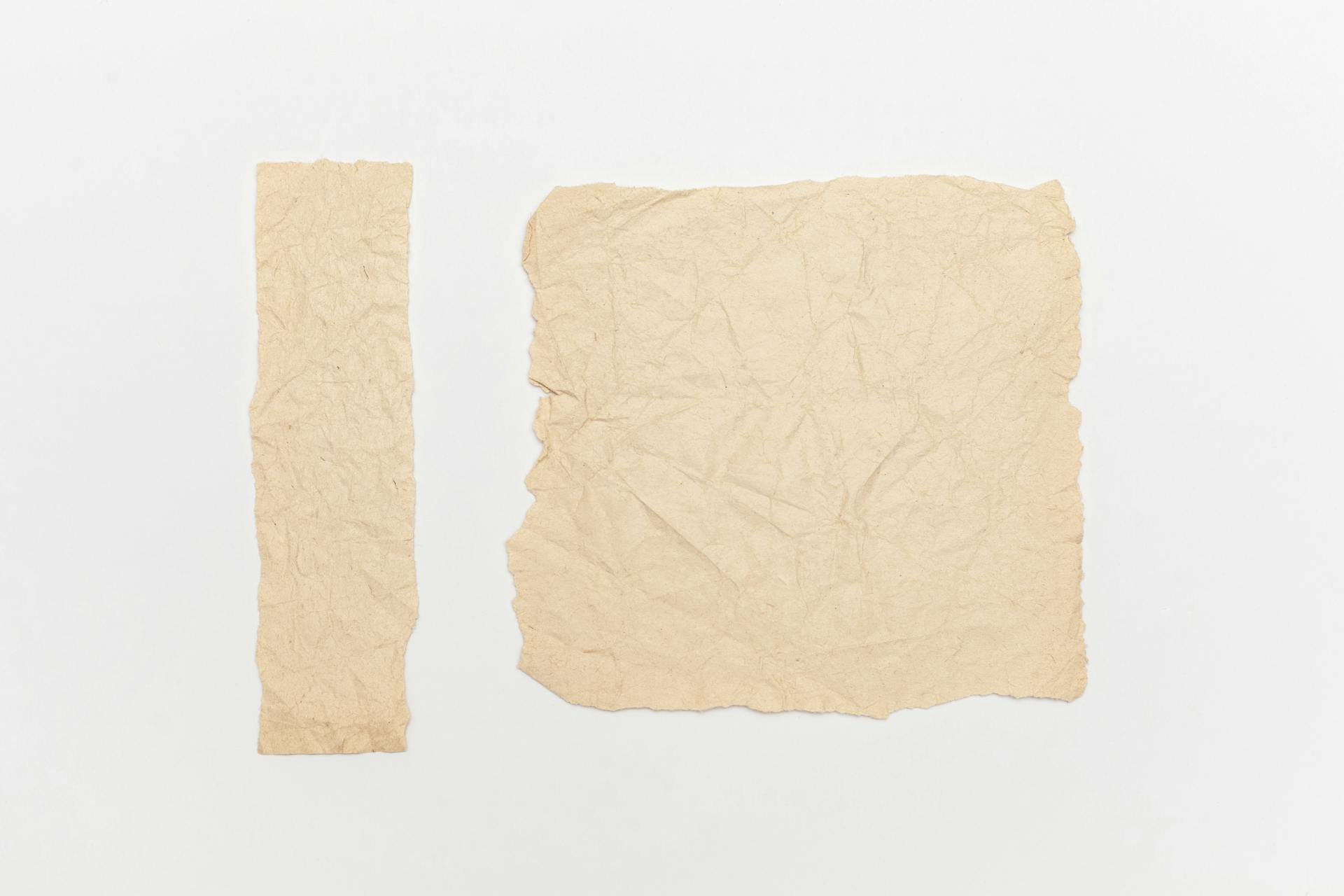 Brown Crumpled Paper On White Background