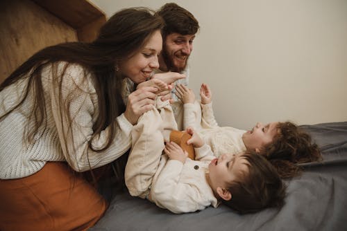 Parents Playing with Their Children 