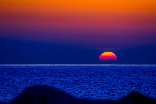 Scenic View of a Placid Sea during Sunset