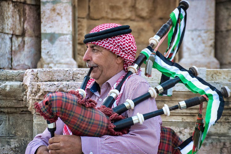 Man Playing Bagpipe