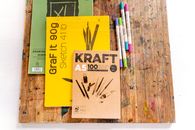 Overhead Shot of Sketchpads and Markers
