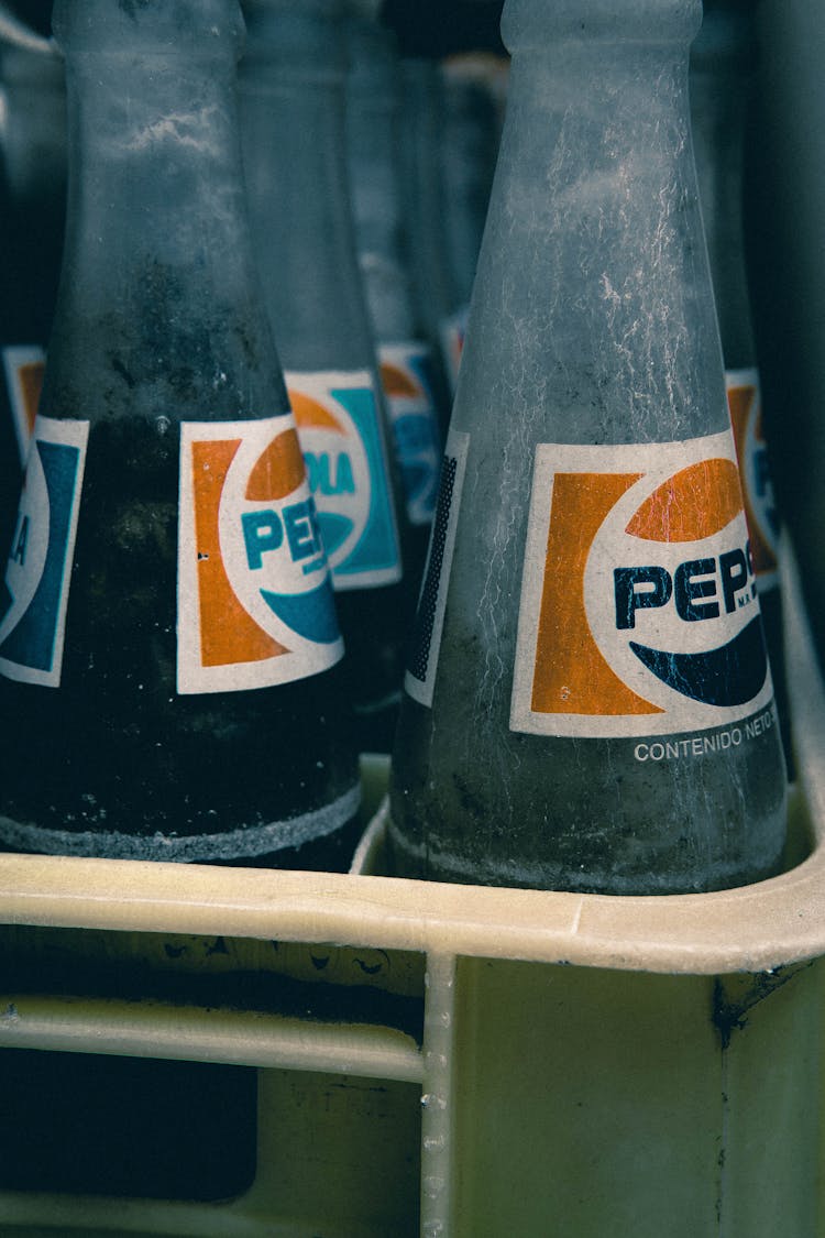 Close-up Of Pepsi Bottles