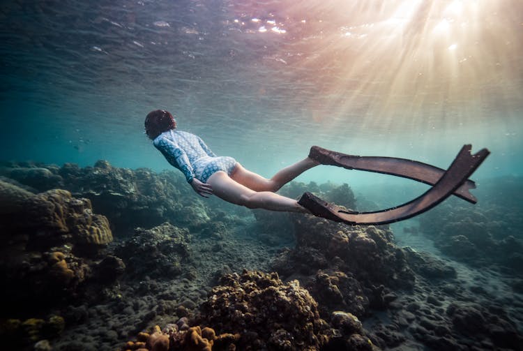 Person Freediving Underwater 