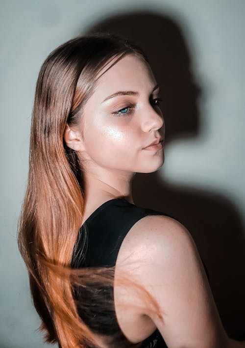 Close-Up Shot of a Pretty Woman in Black Tank Top