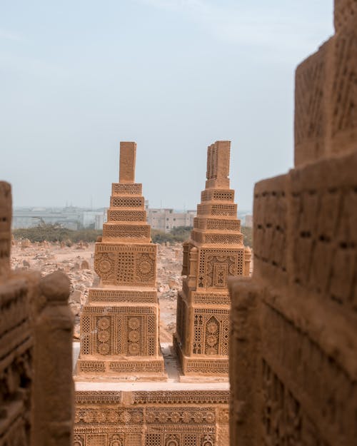 Early Islamic cemetery with tombs decorated with elaborate sandstone carvings called Chaukhandi located in Sindh province of Pakistan in daytime