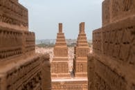 Ornamental ancient sandstone buildings located in Pakistan on cloudy day