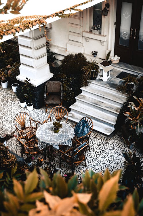 Free Cozy terrace with round table near house Stock Photo