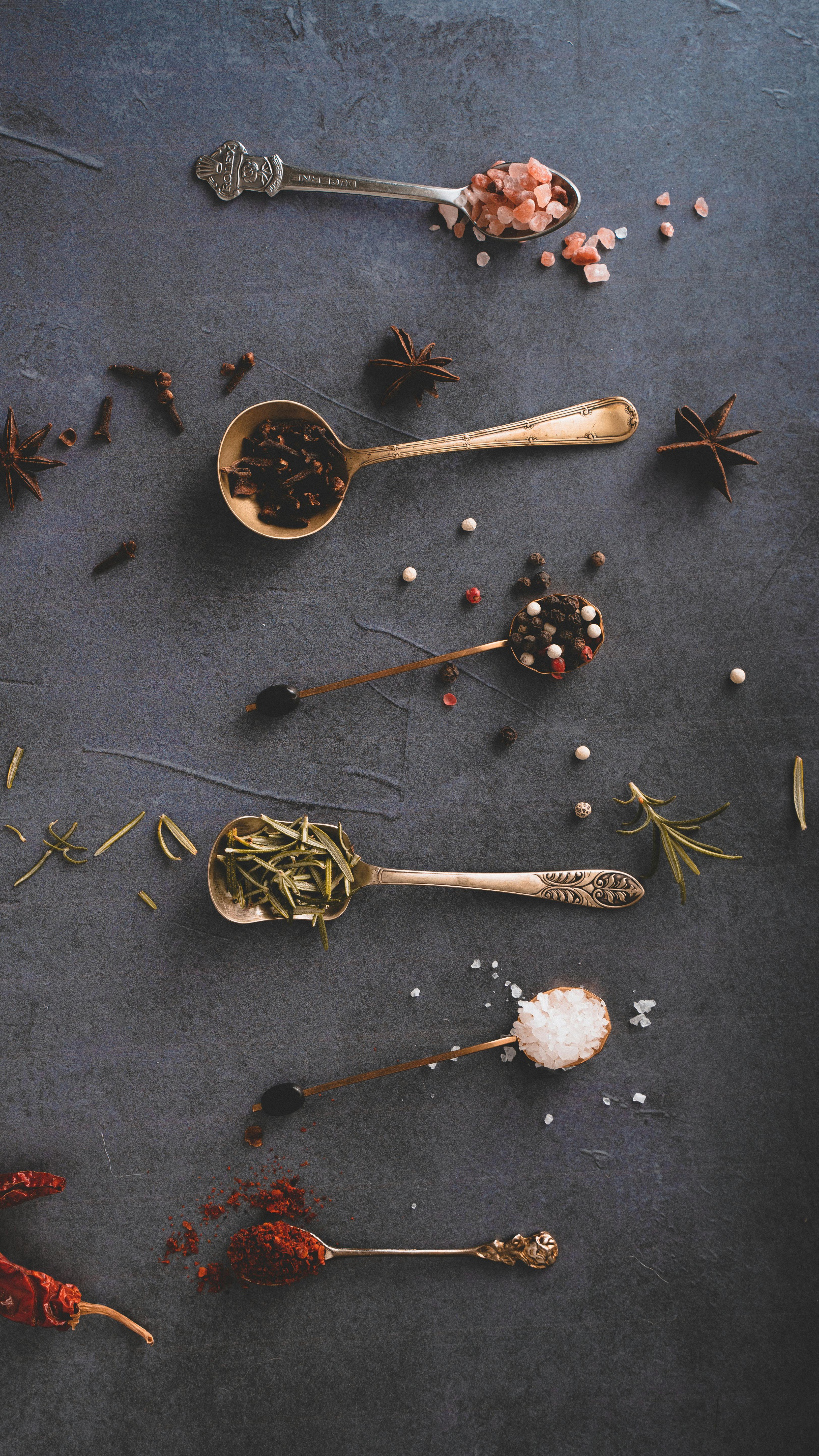 photo of spices on spoons