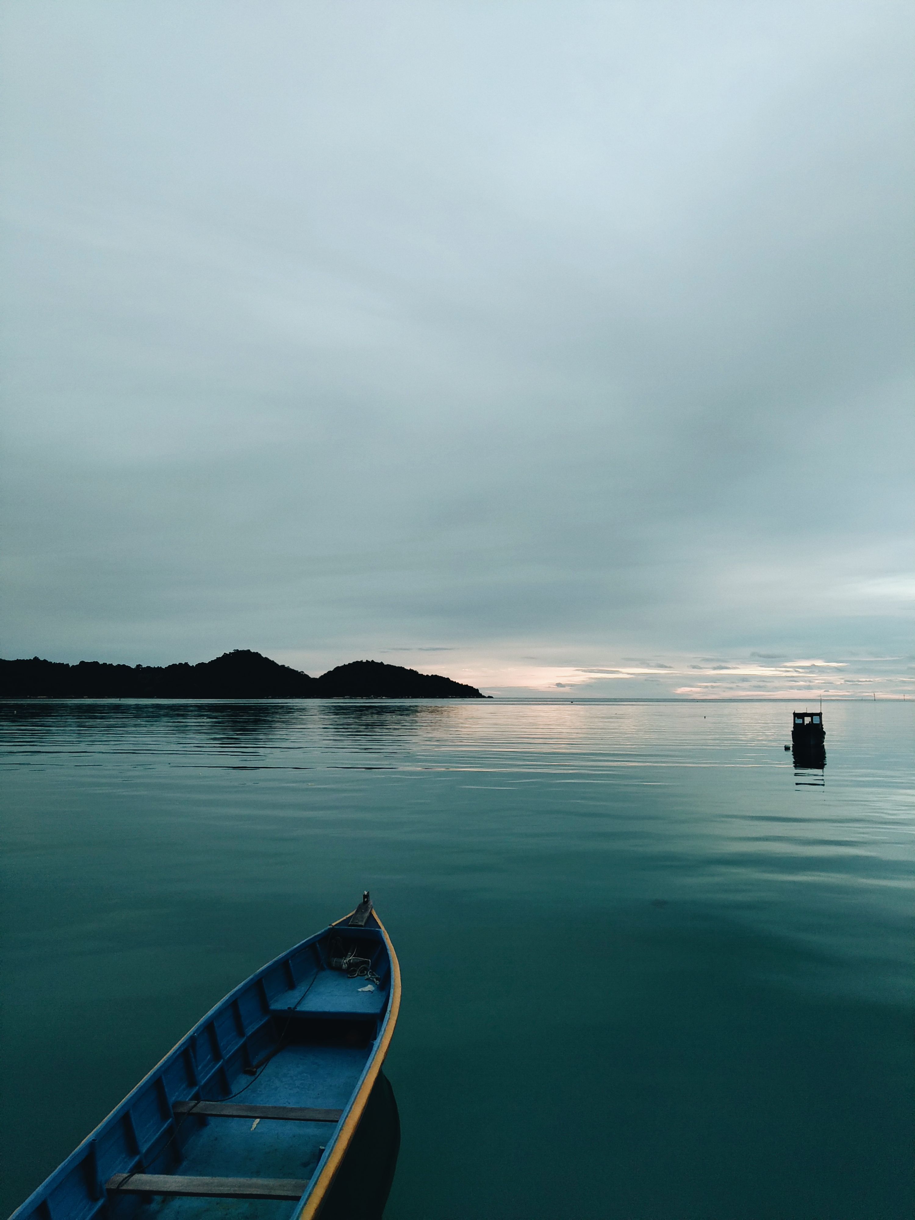 A Blue Boat on the Sea · Free Stock Photo