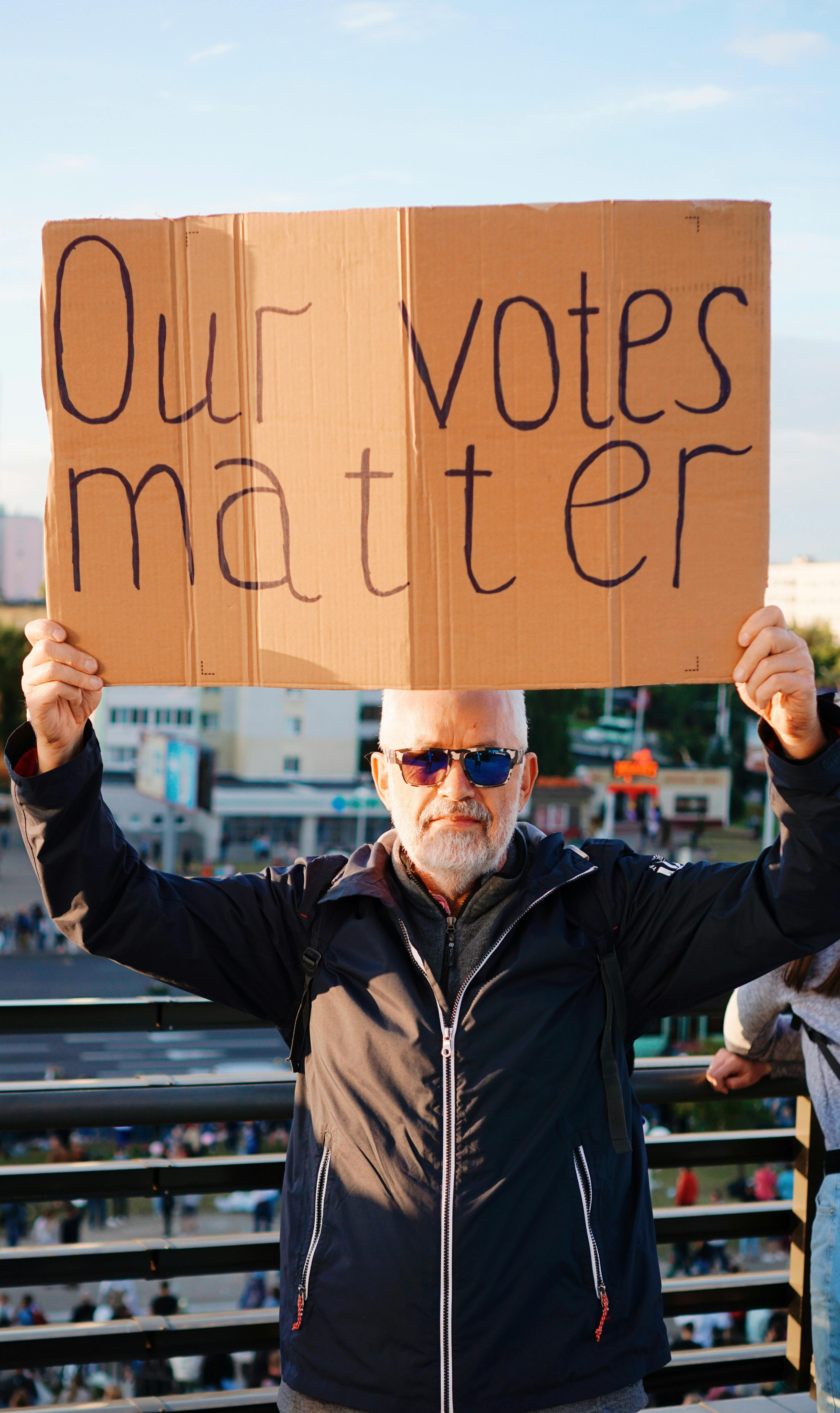 protester holding sign