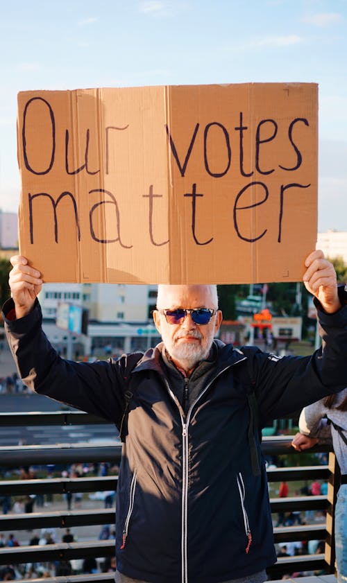 Protester Holding Sign